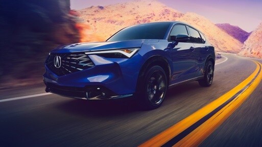 Acura 2025 ADX A-Spec with Advance Package in Adriatic Sea Blue Metallic on the road Acura 2025 ADX A-Spec with Advance Package in Adriatic Sea Blue Metallic on the road