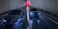 Two 2025 Integra driving in a tunnel, top front view Two 2025 Integra driving in a tunnel, top front view
