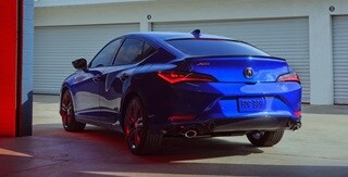 2025 Integra rear view driving on the road 2025 Integra rear view driving on the road