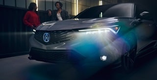 2026 Acura Integra in Urban Gray Pearl with Acura Genuine Accessory Illuminated Front Emblem. 2026 Acura Integra in Urban Gray Pearl with Acura Genuine Accessory Illuminated Front Emblem.