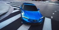 2026 Acura Integra in Double Apex Blue front view. 2026 Acura Integra in Double Apex Blue front view.