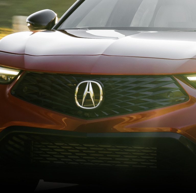 2026 Acura Integra shown in Performance Red Pearl featuring the Front Grille 2026 Acura Integra shown in Performance Red Pearl featuring the Front Grille