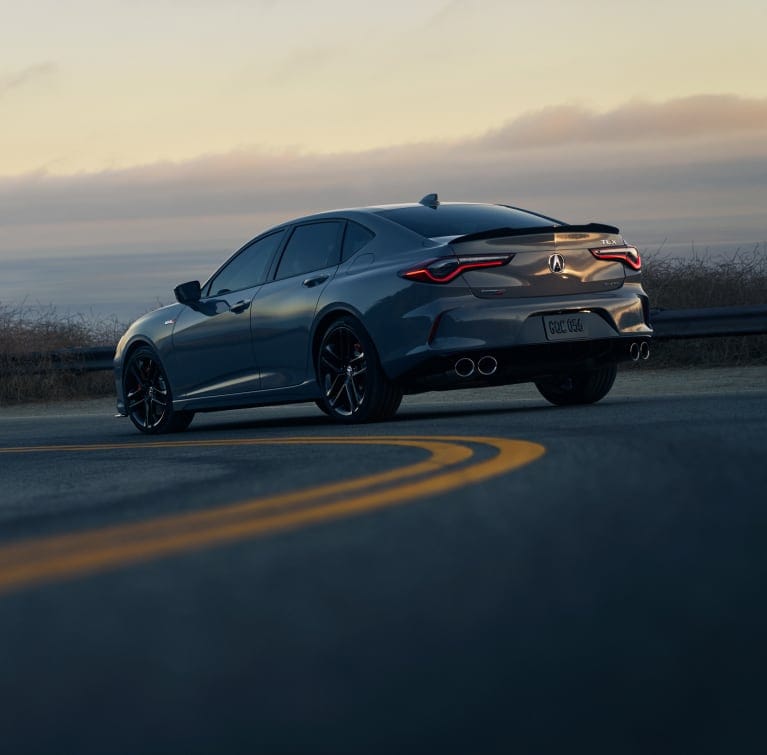 2025 Acura TLX Type S rear view in Urban Gray Pearl. 2025 Acura TLX Type S rear view in Urban Gray Pearl.