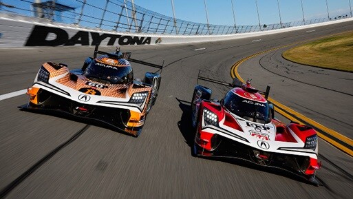 2026 Acura ARX-06 in red profile racing on a track with Grand Prix of Long Beach Logo 2026 Acura ARX-06 in red profile racing on a track with Grand Prix of Long Beach Logo