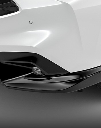 2026 Acura ADX shown in Platinum White Pearl featuring the Front Underbody Spoilers accessory. 2026 Acura ADX shown in Platinum White Pearl featuring the Front Underbody Spoilers accessory.