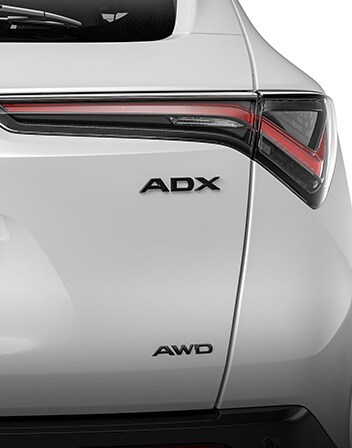 2026 Acura ADX shown in Platinum White Pearl featuring the Gloss Black Emblems accessories. 2026 Acura ADX shown in Platinum White Pearl featuring the Gloss Black Emblems accessories.