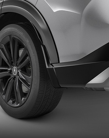 2026 Acura ADX shown in Platinum White Pearl featuring the Splash Guard Set accessory. 2026 Acura ADX shown in Platinum White Pearl featuring the Splash Guard Set accessory.