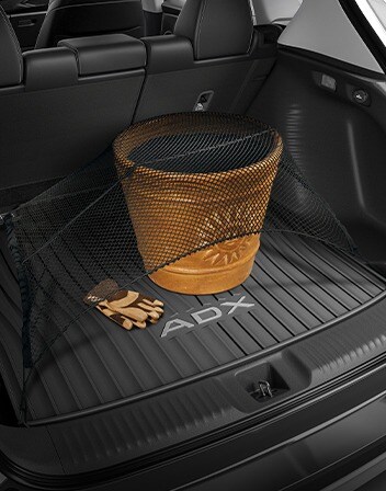 2026 Acura ADX Interior featuring the Cargo Net accessory. 2026 Acura ADX Interior featuring the Cargo Net accessory.