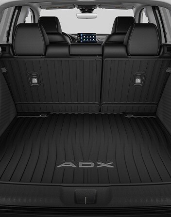 2026 Acura ADX Interior featuring the Cargo Tray accessory. 2026 Acura ADX Interior featuring the Cargo Tray accessory.