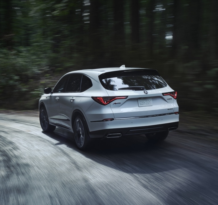 2026 Acura MDX A-Spec in Platinum White Pearl rear 3/4 view 2026 Acura MDX A-Spec in Platinum White Pearl rear 3/4 view