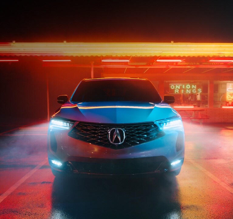 Acura 2026 RDX A-Spec in Apex Blue Pearl headlight close up Acura 2026 RDX A-Spec in Apex Blue Pearl headlight close up