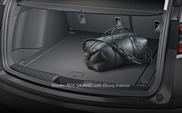 Acura 2026 RDX with Technology Package and Parchment Interior, showing cargo space. Acura 2026 RDX with Technology Package and Parchment Interior, showing cargo space.