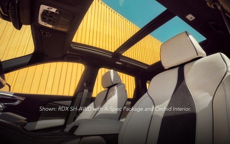 Acura 2026 RDX SH-AWD with A-Spec Advance Package with Orchid Interior, showing panoramic moonroof. Acura 2026 RDX SH-AWD with A-Spec Advance Package with Orchid Interior, showing panoramic moonroof.