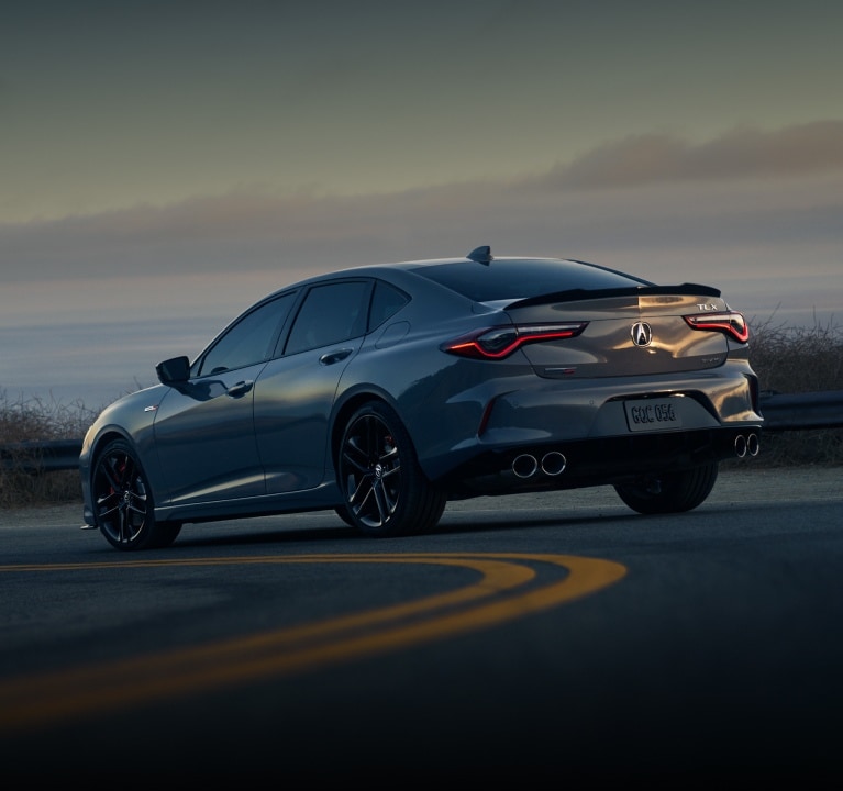 2025 Acura TLX Type S in Urban Gray Pearl rear view. 2025 Acura TLX Type S in Urban Gray Pearl rear view.