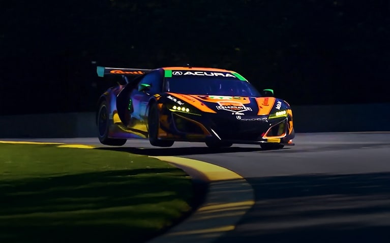 The Energy Of Racing, with the Acura Type S racing car driving on a championship race.